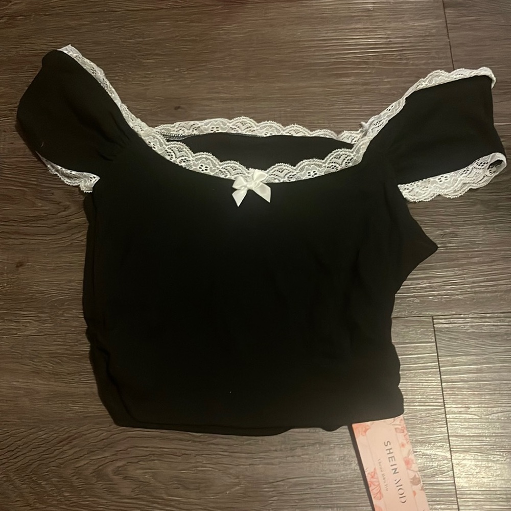 Black crop top with lace trim and bow